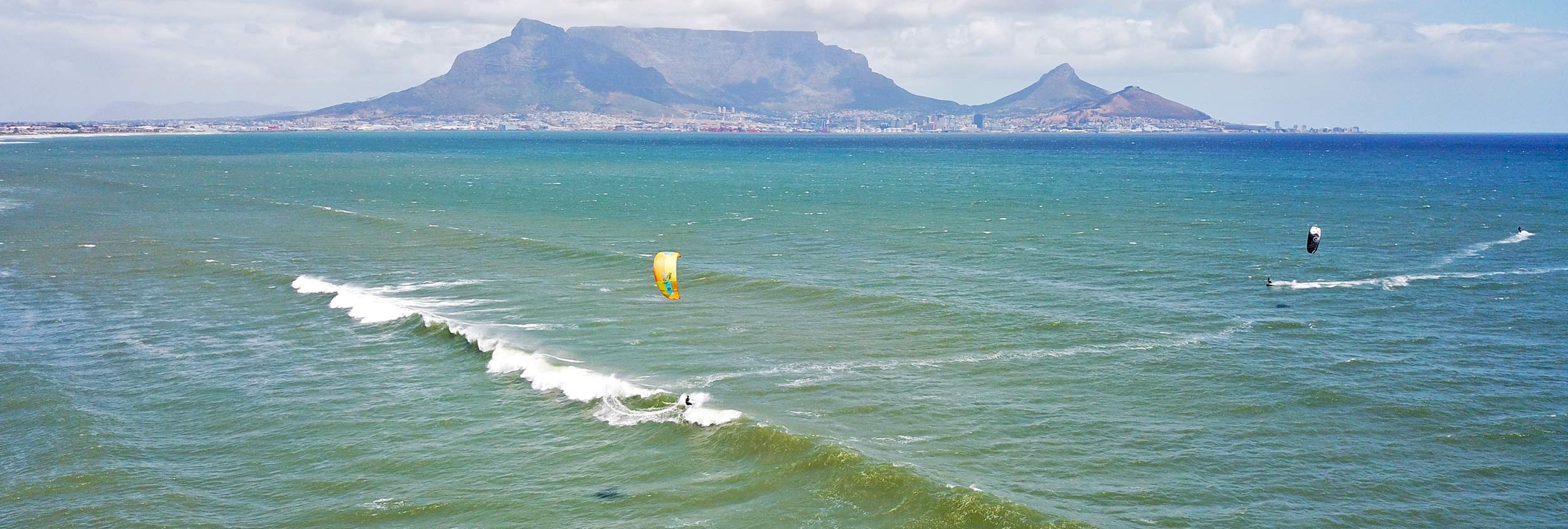 Kitesurfing at Sunset Beach in Cape Town